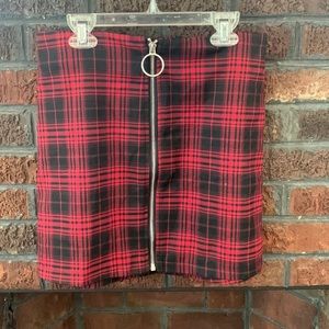 Plaid mini skirt size small. Never worn.